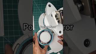 Creating a customized pocket mirror using We R Memory Keepers Button Press. 😊