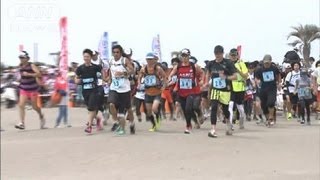 砂浜を走る過酷なマラソン　千葉・九十九里浜（12/06/03）
