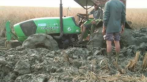 Yanmar Harvester deep mud stuck My Deutz Fahr 4wd and powertrac 4wd help  #Tractor media