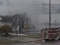 Fire at tire business emits heavy smoke onto West Market Street.