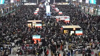 Crowds throng Shanghai train station during Chinese New Year travel rush | AFP