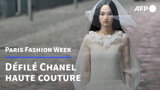 A Paris, défilé Chanel haute couture sur un quai de Seine | AFP