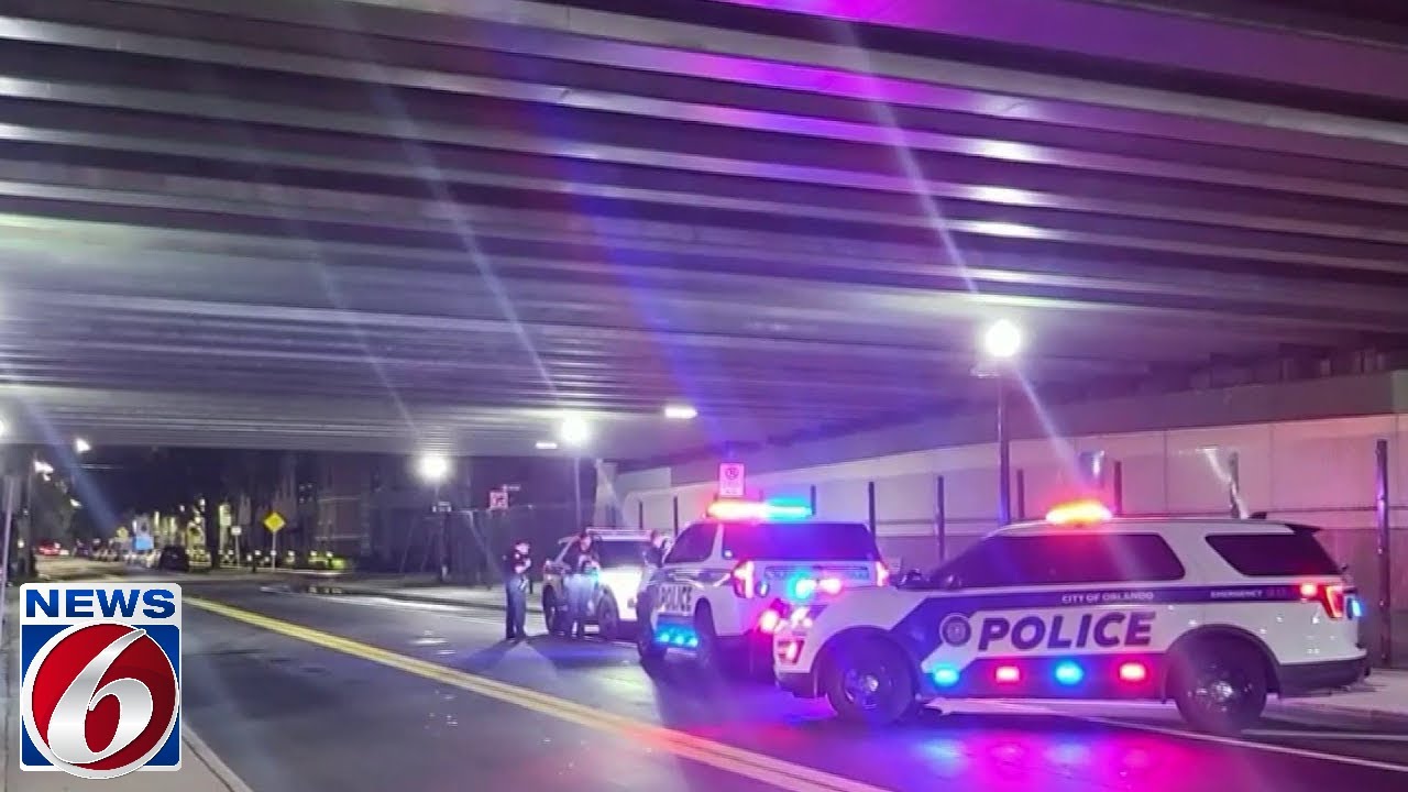 Manhunt underway after man opens fire on Orlando police officers - YouTube