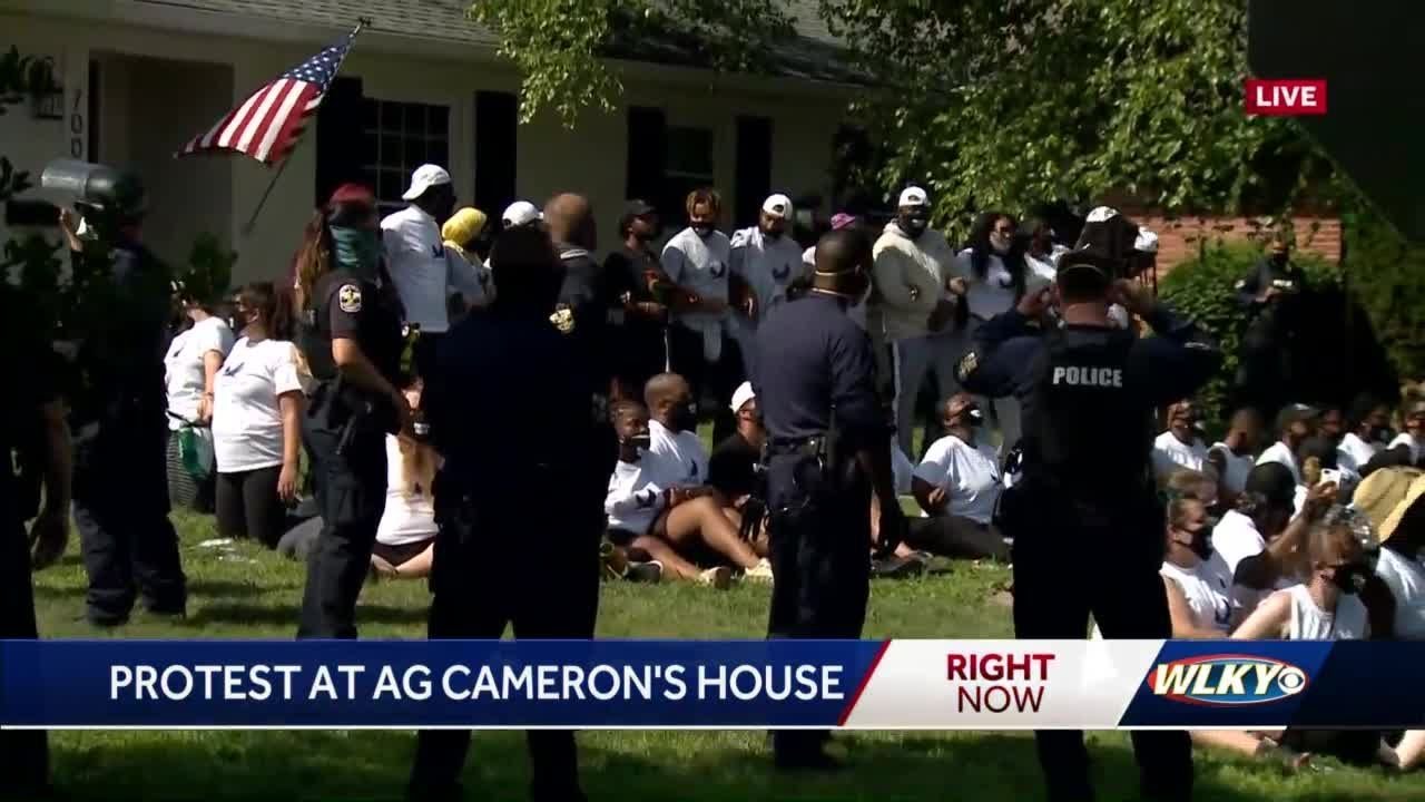 Protesters gather at Attorney General Daniel Cameron's house