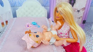 Baby doll and Barbie. Evening routine in games with dolls