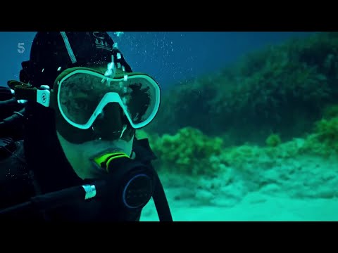 A female and a male diver on a ...deadly... research dive