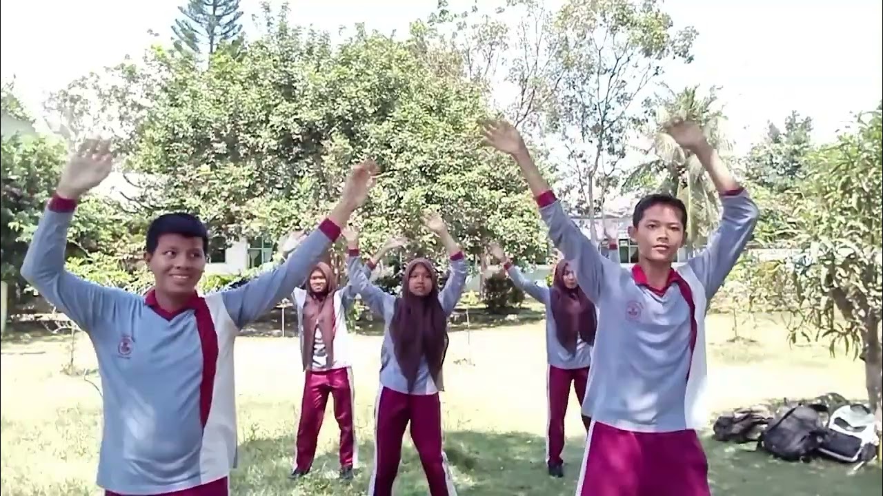 Senam aerobik 15 menit kelompok 1 kelas IX-3 SMP NEGERI 3 TANJUNG BERINGIN 