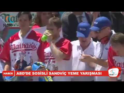 Video: ABD'deki Uluslararası Sosisli Sandviç Yeme Yarışması Nasıldır?