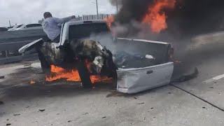 2 Heroes Rescue Driver Trapped Inside Burning Truck
