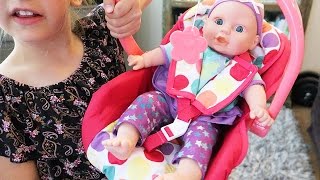 Madison got a newCar Seat baby doll from Target. She got a Circo Feed and Sleep Doll and she also got a baby doll car seat to put 