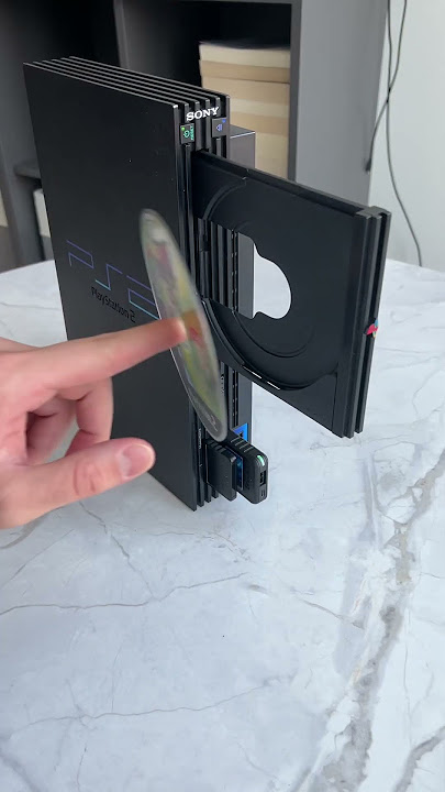 Original PS2 βFatβ VS PS2 Slim Disc Trays
