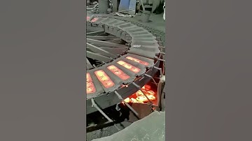 Under 1000°C, Workers Manipulate Red-Hot Billets