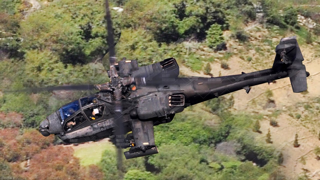 ⁣US Apache Helicopter Performs Crazy Low Altitude Maneuvers