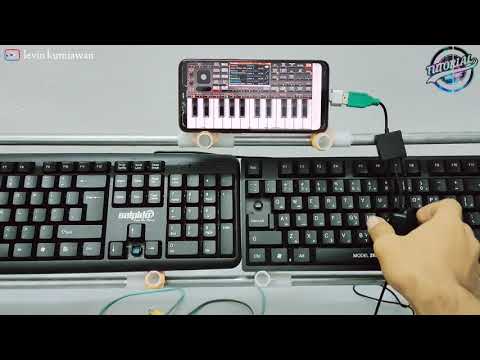 Video: Bagaimana Menghubungkan Dua Keyboard