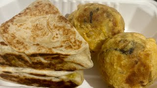 Sri Lankan street foodtasteofsrilanka aloobondamasalavadaindianstreetfood chickentikkamasala ?