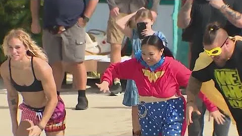 Hundred polar plunge at Florida waterpark