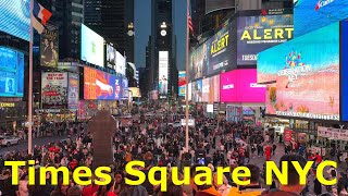 Walking at Times Square NYC from daylight to city lights