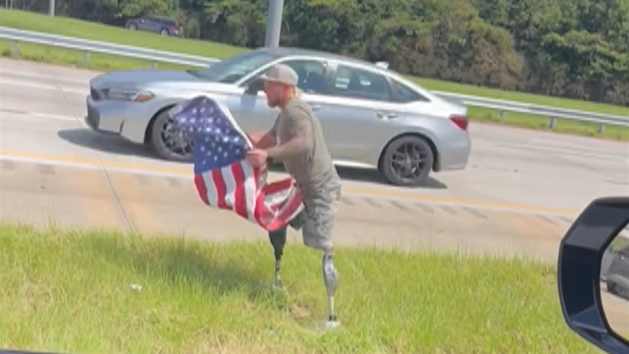 Double Amputee Marine Veteran Rescues Stars And Stripes From Highway