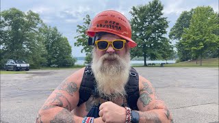Hiking With, my big biceps out in my bib overalls
