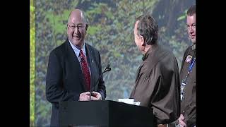 Johnny Morris Presents Donation Check to NWTF CEO George C. Thornton