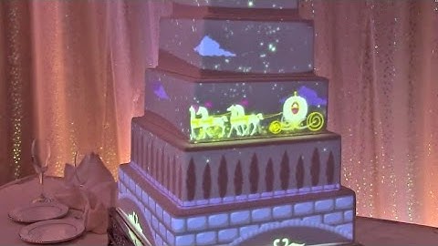 Interactive wedding cake projection mapped from Disney Fairytale Weddings