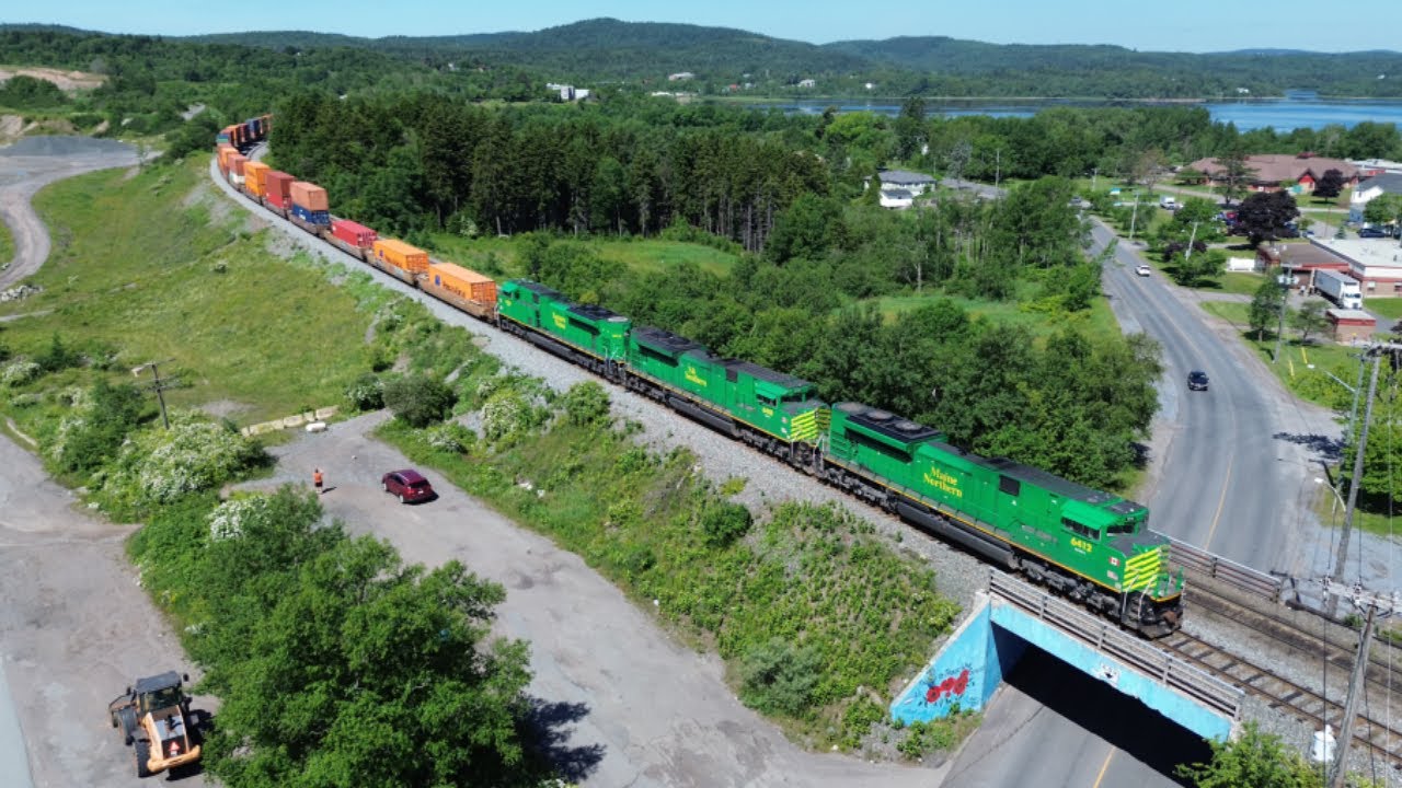 Awesome Aerial 4K View! Long Stack Train NBSR 120 Entering Ponderosa Yard - West Saint John, NB