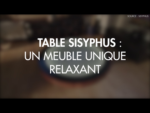 Une bille et du sable pour habiller cette table