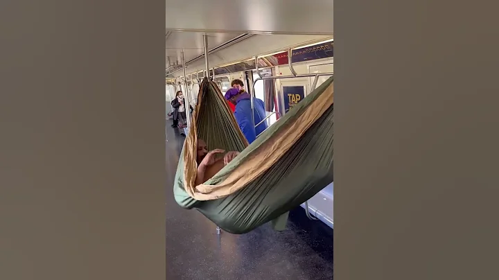 Homeless man sleeps on a hammock on NYC train, but gets interrupted by sumo wrestlers! #shorts