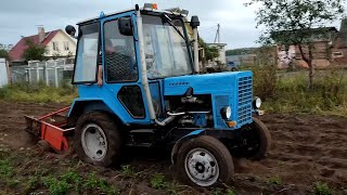 A homemade digger at work after the rain. Homemade tractor