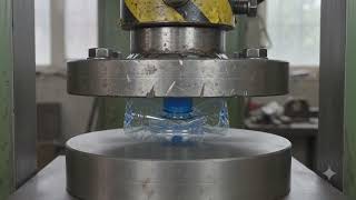 Hydraulic press crushing plastic… 202606021611