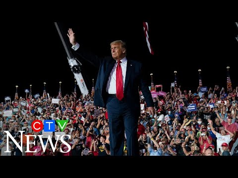 Trump hits campaign trail, holds rallies after negative test