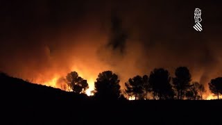 Forest fires continue to burn in spain. the region of valencia, a fire
that has already devastated thousand hectares forces 2,500 people
evacuate ...