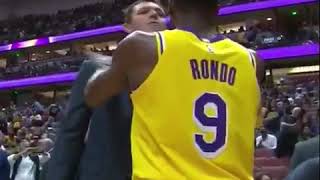 Rajon Rondo tipoff ritual with the coaching staff