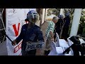 Riot police break up opposition leader