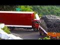 Long Chasis Trucks Turning In Narrow Bend In Dhimbam Hills