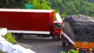 Long Chasis Trucks Turning In Narrow Bend In Dhimbam Hills