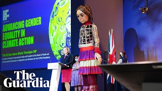 Cop26: 'Little Amal' takes centre stage on Gender Day