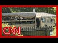 Military vehicles move outside White House amid protests