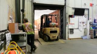 loading the truck using forklift