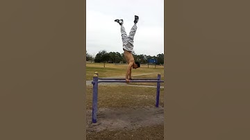 Handstand on parallel bar