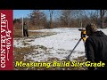 Laying our build site and Measuring grade.  Pole barn workshop Build #1
