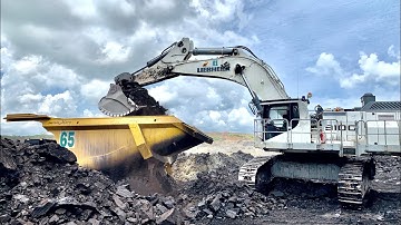 Liebherrr  9100 excavator loading coal on truck komatsu 785