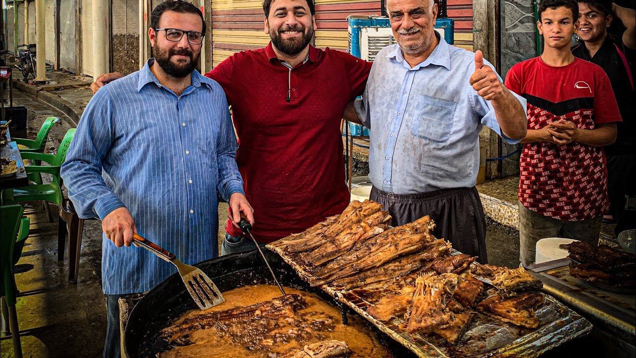 ٤٠ سنة العم ابو صهيب صارله يبيع السمك المقلي في الموصل #اكل_الشوارع