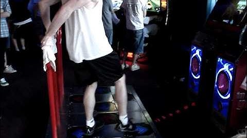 Insane DDR kid gets perfect score!