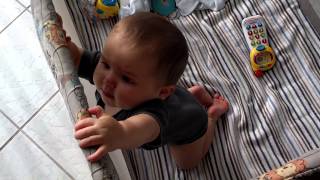 Baby Dominic stands up @ 9mo in Baby Trend PlayPen