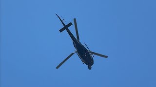 Private Aerospatiale AS355 circling above Hampstead Heath