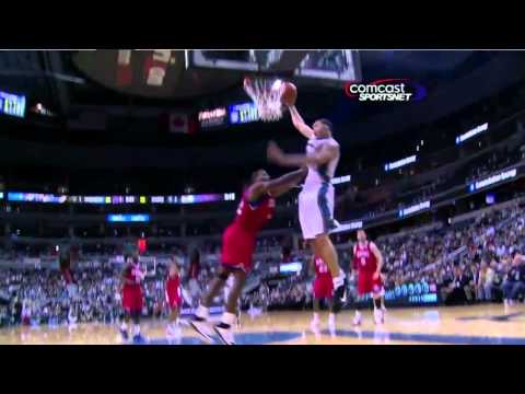 McGee somehow finishes this dunk while getting shoved in the chest by Elton Brand. He's luck he's got those long ass arms. To me, this was a flagrant 1..but ...