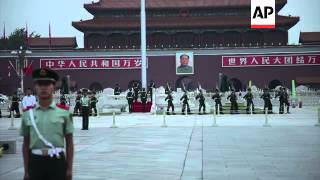Flag raising, tight security in capital on anniversary of 1989 crackdown