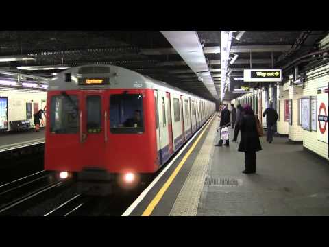London Underground (LU) - District Line D78 stock trains at Stepney Green