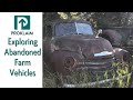 Exploring abandoned and rusting farm vehicles